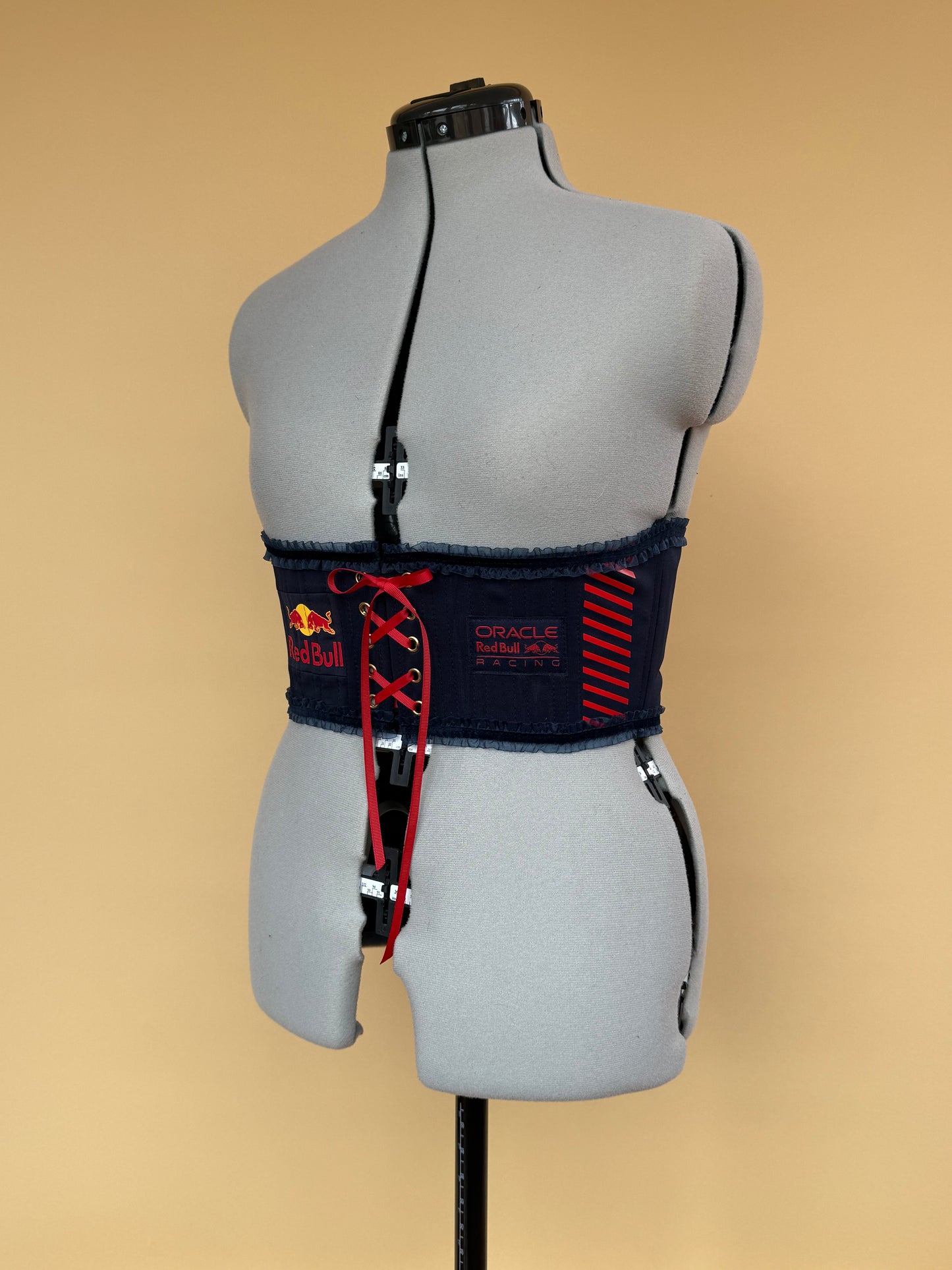 Sample Red Bull frilly corseted front and back lacing belt - S